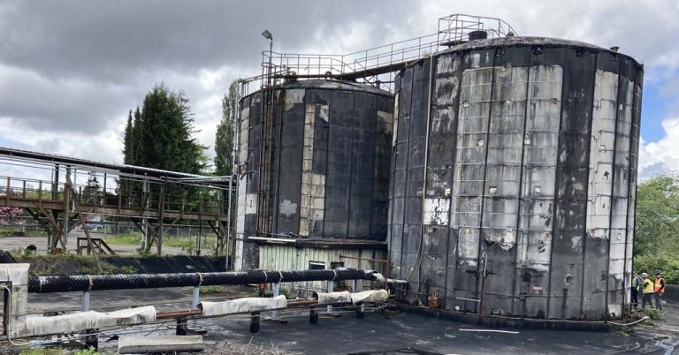 Storage tanks at the former Cosmo Specialty Fibers pulp mill