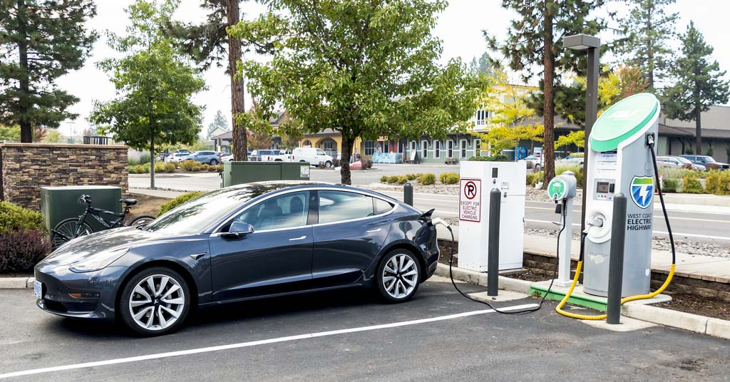 EV charging station with car on Oregon street