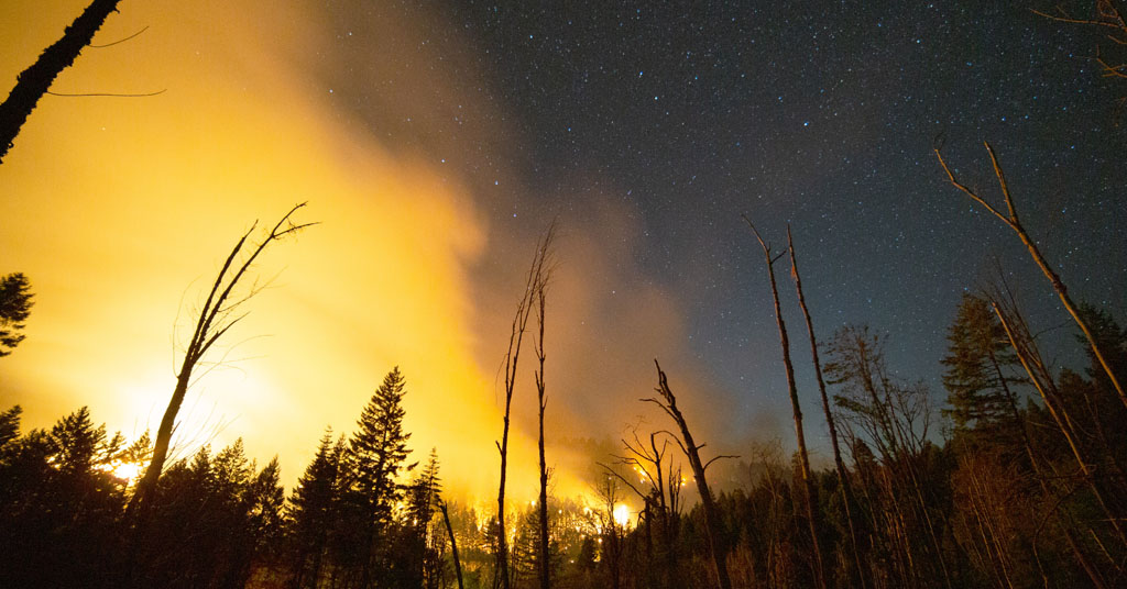 Night sky brightened by Canyonville Fire in southern Oregon in 2019.