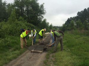 Friends of the Sandy River Delta volunteers working on the boundary trail.