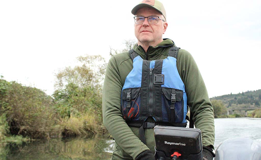 Ian Sinks pilots boat on Grays River