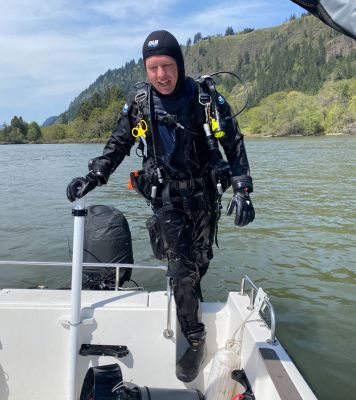 Mayo Archer on boat in Columbia River