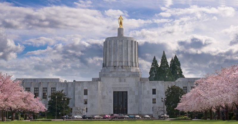 Oregon State Capitol Building and Spring blossoms in Salem, Oregon. Photo by Jim Coate/Flickr