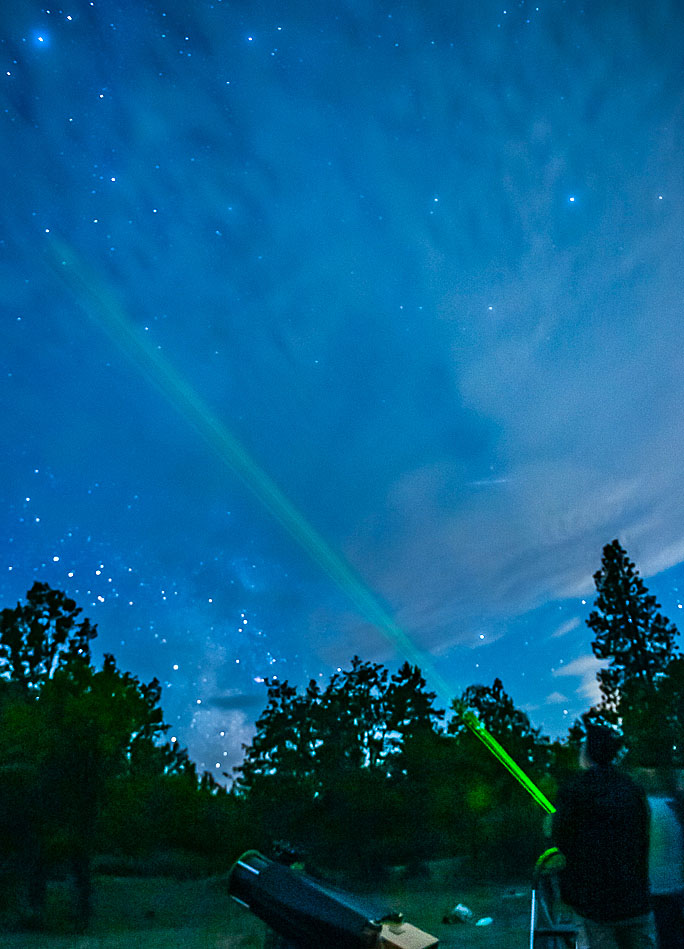 Mike McKeag uses a laser pointer during a presentation in Hood River, Ore.