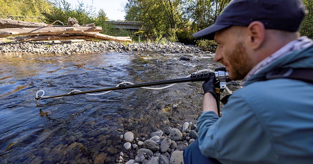 WDFW researcher conducts eDNA study in a Washington river